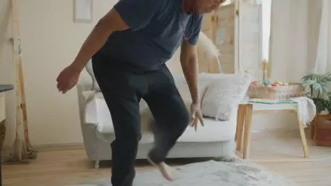 AI Video from prompt: a man move his leg