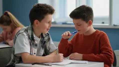 AI Video from prompt: A teenage boy sitting with a cute girl in class 