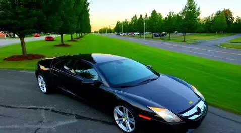 AI Video from prompt: the car in the photo is driving through the city