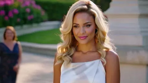 AI Video from prompt: A goofy wonky black man fell in with a gorgeousl