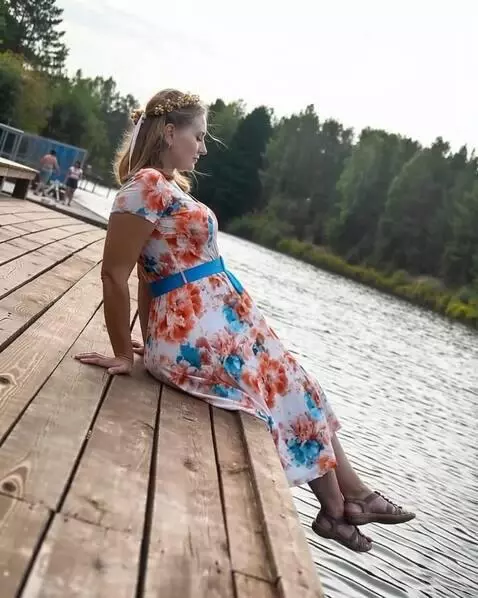 AI Video from prompt: A massive, taut belly swollen to the extreme, st