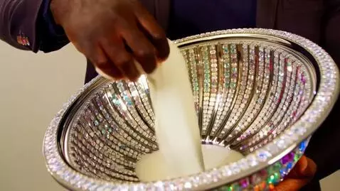 AI Video from prompt: “THE CEREAL BOWL CHAIN”  Scene: Ultra-slow-mo cl