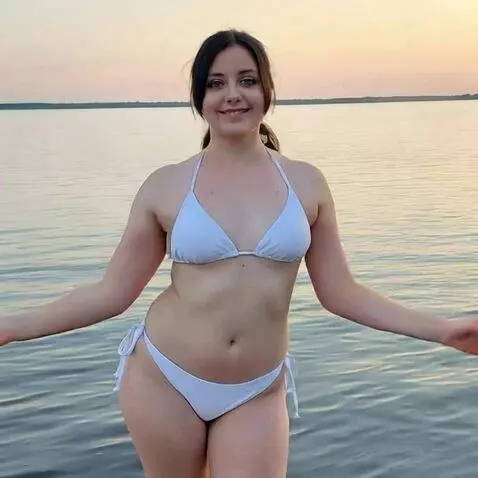 AI Video from prompt: girl dancing and shaking on the beach