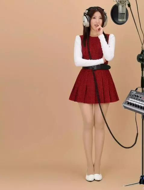 AI Video from prompt: A woman wearing headphones is actively singing i