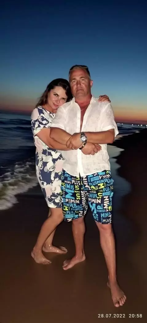 AI Video from prompt: Improve your photo quality. The woman and man lo