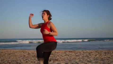 AI Video from prompt: Woman dancing on beach