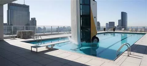 AI Video from prompt: С неба в бассейн падает автобус