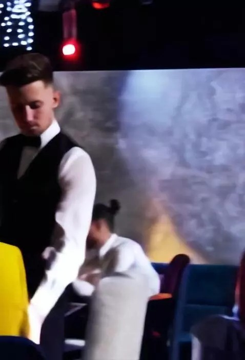 AI Video from prompt: The photo shows a hookah on a stand with a statu