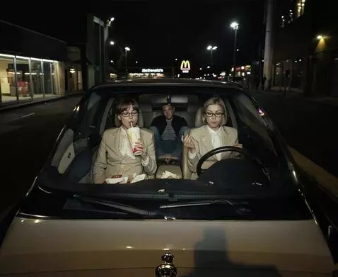 AI Video from prompt: the girl on the left is drinking from a straw, t