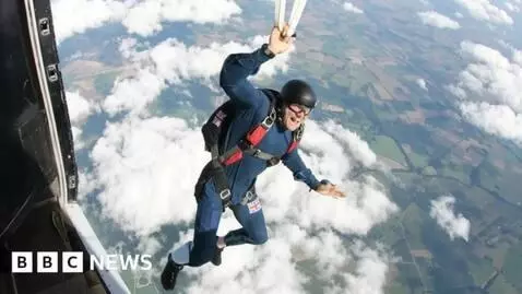 AI Video from prompt: A man pulls the ring to open a parachute, but in