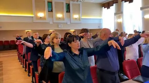 AI Video from prompt: People dance in the macarena style