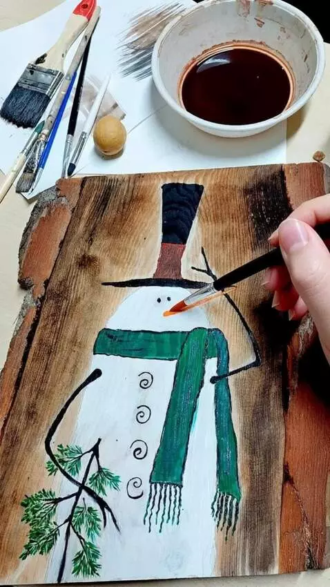 AI Video from prompt: Make a video of a snowman gradually appearing on