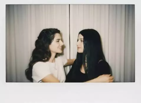 AI Video from prompt: два человека нежно обнимаются, и смотрят прямо н