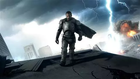 AI Video from prompt: A man in battle armor stands on the roof of a de