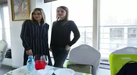 AI Video from prompt: The girls exchange all their clothes that they a