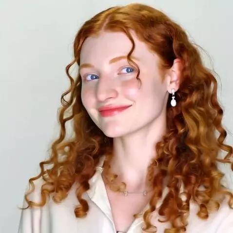 AI Video from prompt: Walking along the beach in a bikini