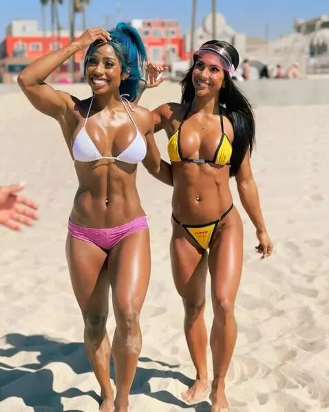 AI Video from prompt: Two women walk forward, smoothing their hair and