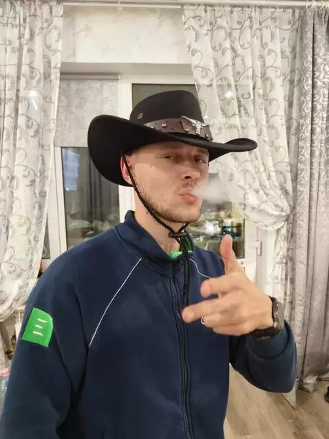 AI Video from prompt: The man shoots his fingers like a revolver, then