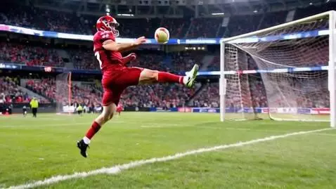 AI Video from prompt: Ultra realistic football stadium match scene: a 