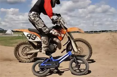 AI Video from prompt: The motorcyclist landed on a children's tricycle