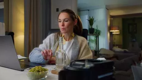 AI Video from prompt: заводчанин который пришел с работы и сел за комп