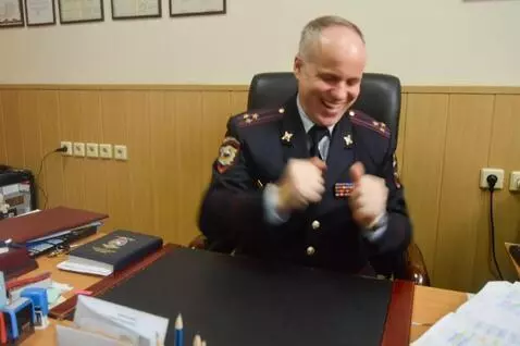 AI Video from prompt: a man who sits and dances and smiles