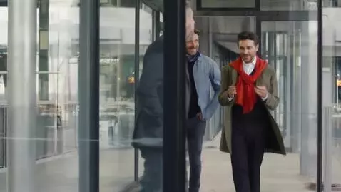 AI Video from prompt: Человек заходит в пункт выдачи OZON и человек на