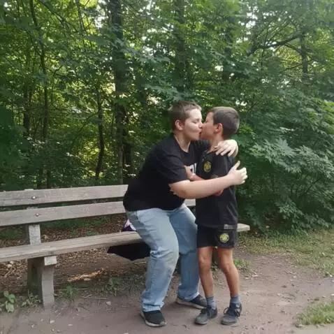 AI Video from prompt: They stand up and kiss after that a lot of peopl