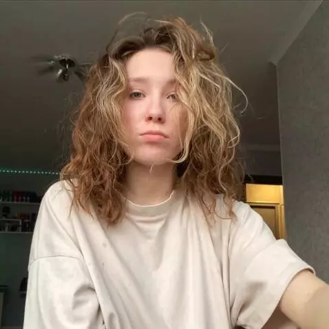 AI Video from prompt: She pulls back, raises her legs, shows her sweat