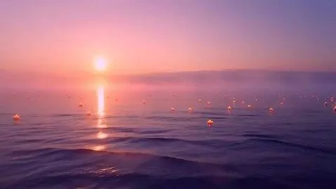 AI Video from prompt: A cinematic sunset scene over a calm ocean, enha