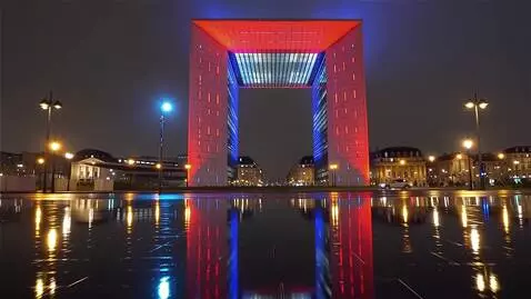 AI Video from prompt: A cinematic night shot of La Défense arch in Par