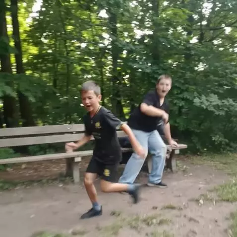 AI Video from prompt: They stand up one of them turns red and starts t