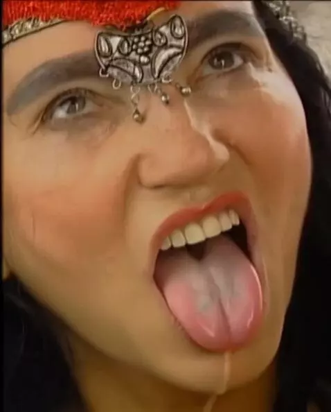 AI Video from prompt: Looking at viewer mouth wide open tongue stickin