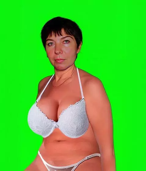 AI Video from prompt: She stares at the viewer. alluring, but hard to 