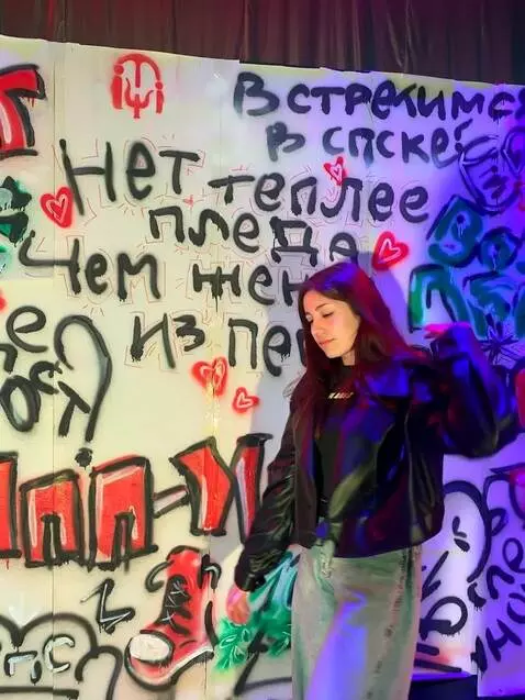 AI Video from prompt: the girl turns her back and bends forward