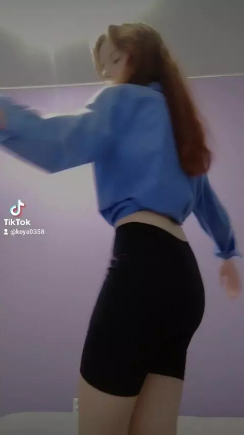 AI Video from prompt: the girl turns her back and bends forward