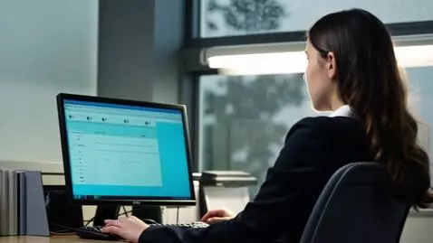 AI Video from prompt: **Shot 1 (0-15 sec)**  **Location:** Office, eve