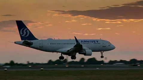 AI Video from prompt: A passenger plane lands beautifully at a beautif