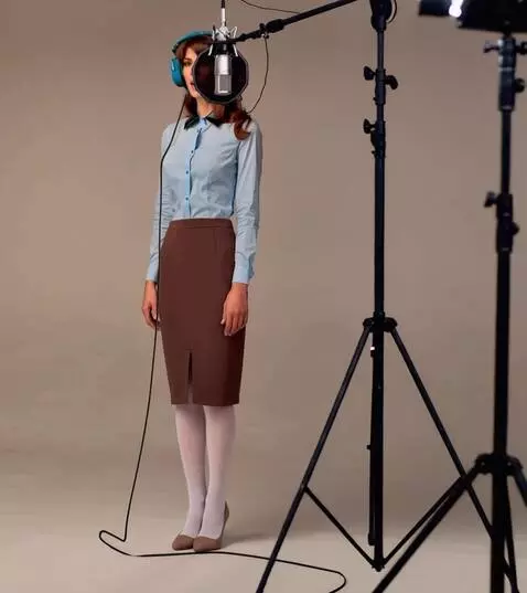 AI Video from prompt: A woman with headphones is singing. The camera r