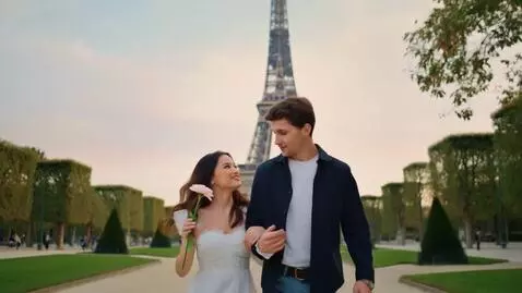 AI Video from prompt: A romantic scene of a loving couple walking in t