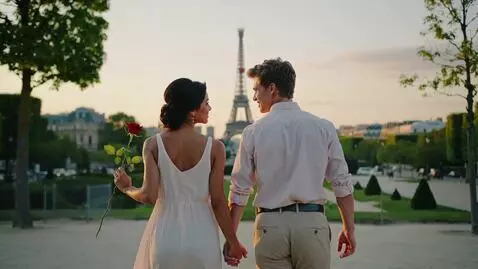 AI Video from prompt: A romantic scene of a loving couple walking in t