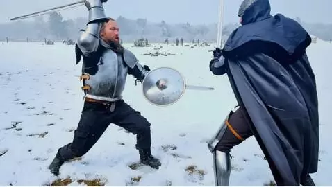 AI Video from prompt: Two men sword fight in the snow. The camera sirk