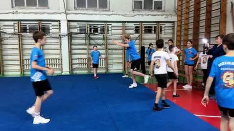 AI Video from prompt: A girl wearing a dark purple dress starts doing 