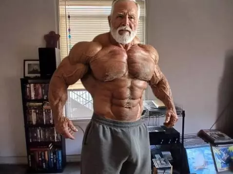 AI Video from prompt: a professional bodybuilder flexes his body