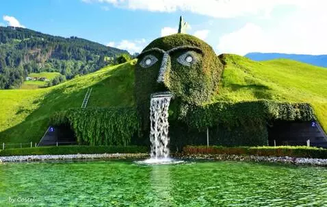 AI Video from prompt: a big green monster emerges from the ground