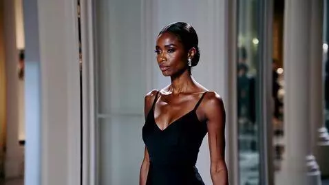 AI Video from prompt: Walk through of high fashion Chanel model, tall 