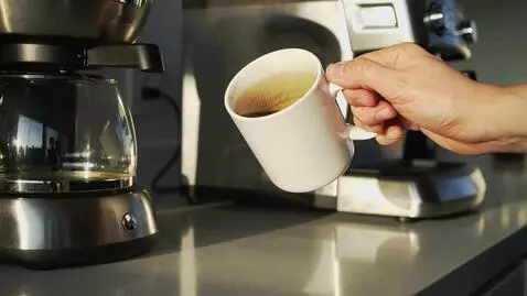 AI Video from prompt: “POV: Making morning coffee in a modern kitchen,