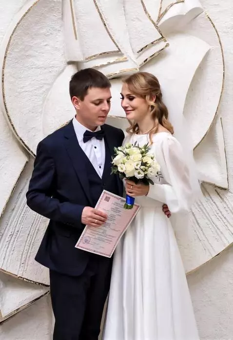 AI Video from prompt: In a tender moment of connection, the groom brus