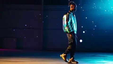 AI Video from prompt: Fashion editorial shot of urban model with short