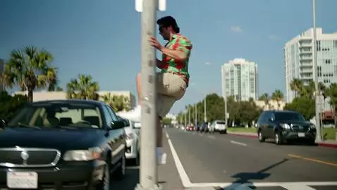 AI Video from prompt: A boomer with dark shades and a Hawaiian shirt c